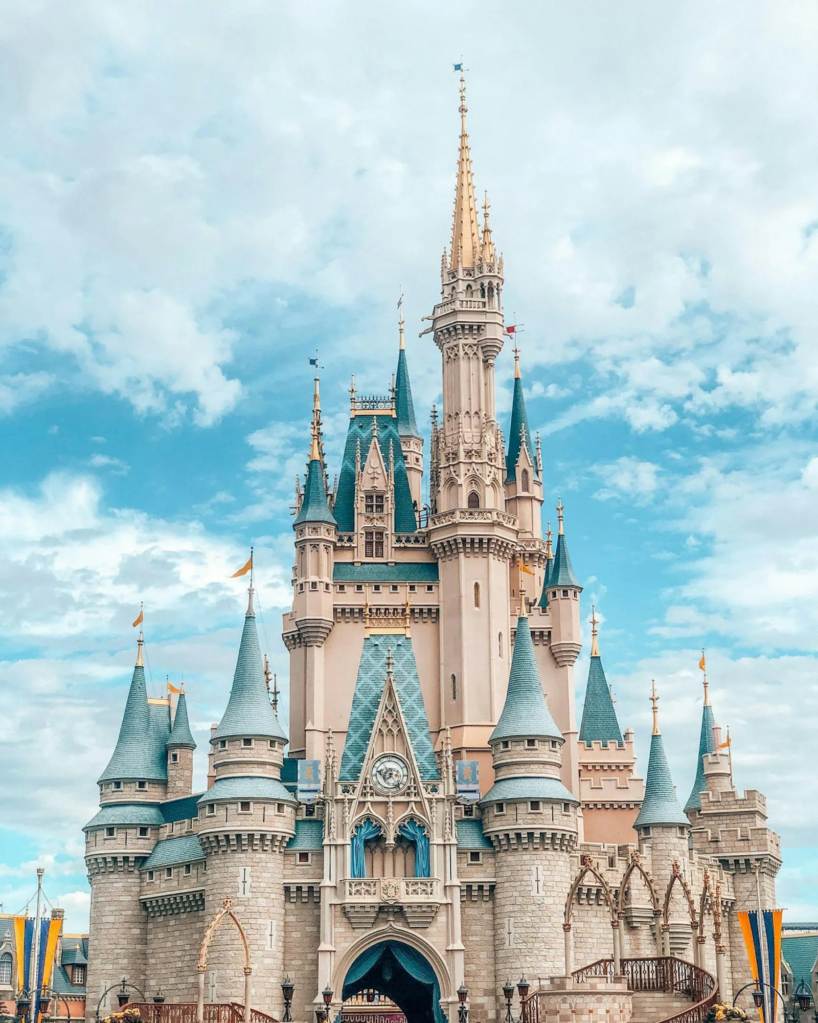 Cinderella Castle rising above the gardens at Magic Kingdom