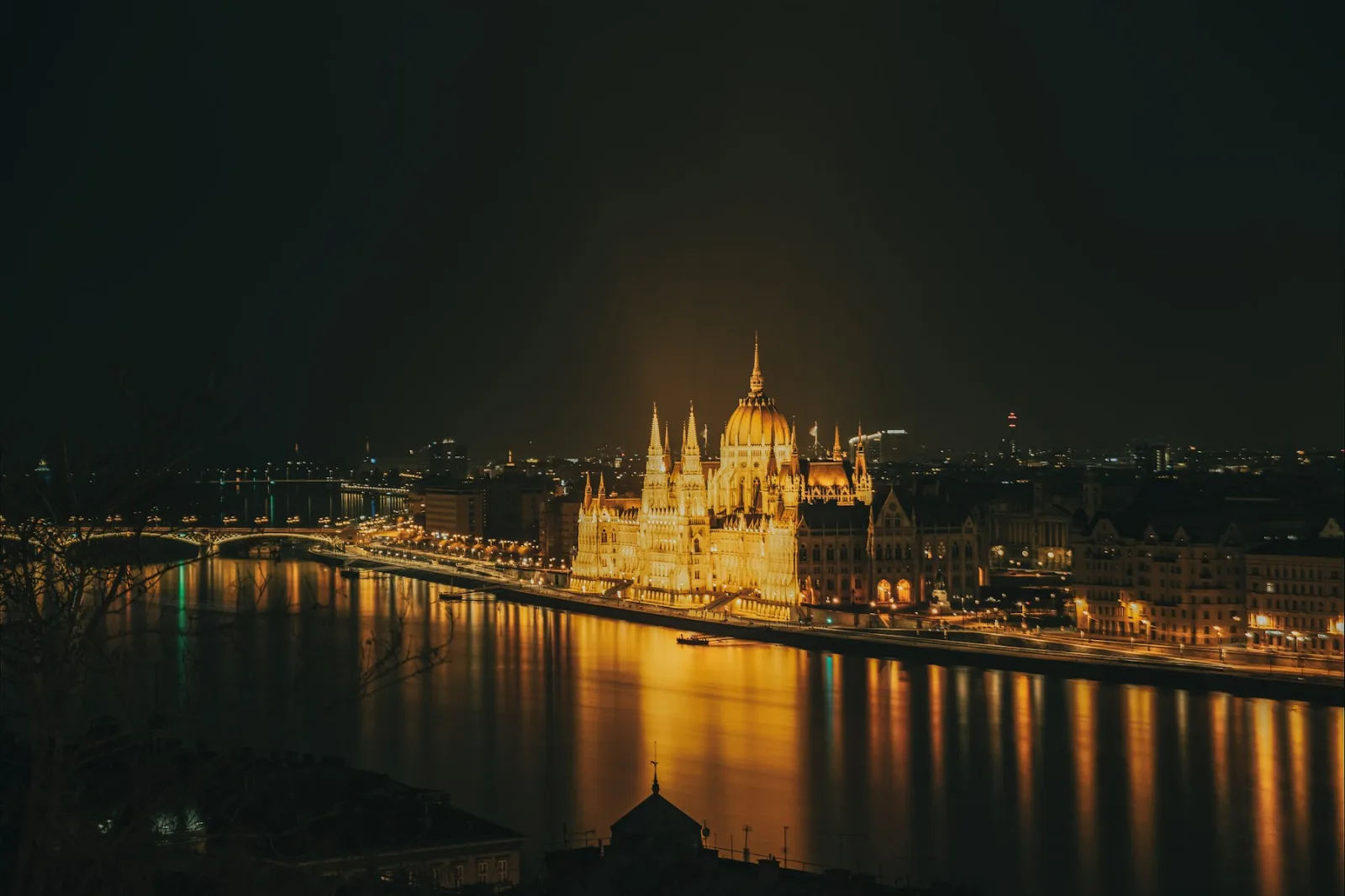 Budapest Parliament and the Danube illuminated at night